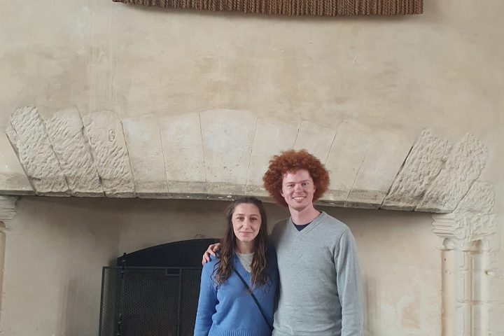 a person standing in front of a building