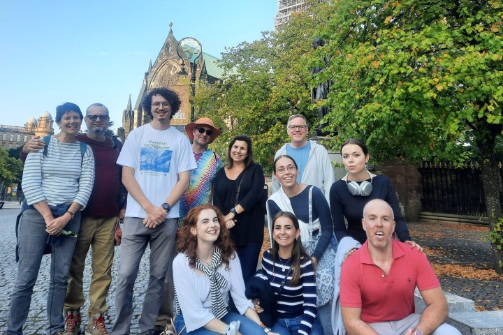 a group of people posing for the camera