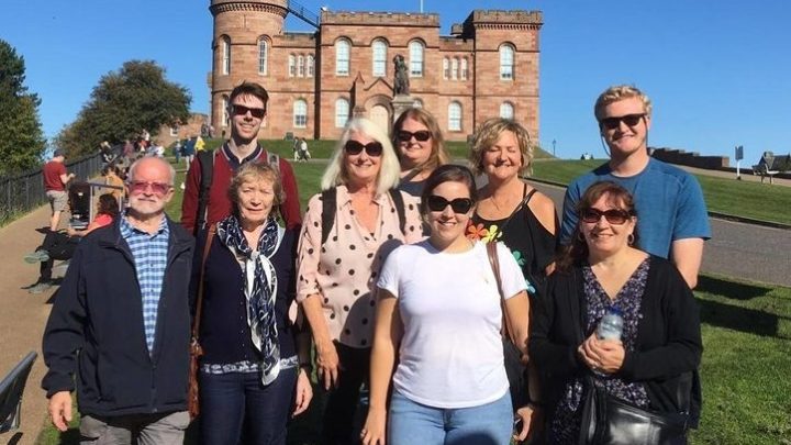a group of people posing for the camera