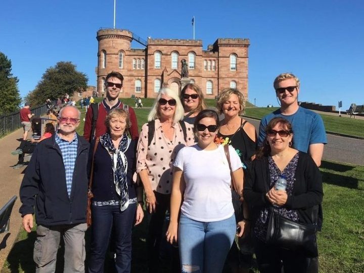 a group of people posing for the camera