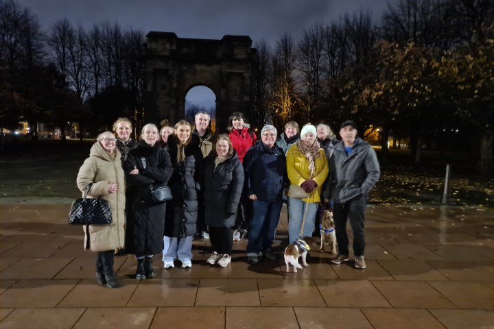 a group of people posing for a picture