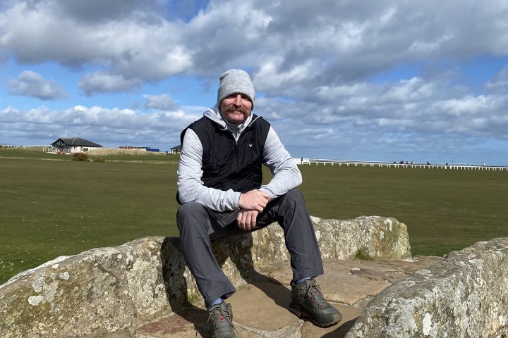 a man standing on a rock