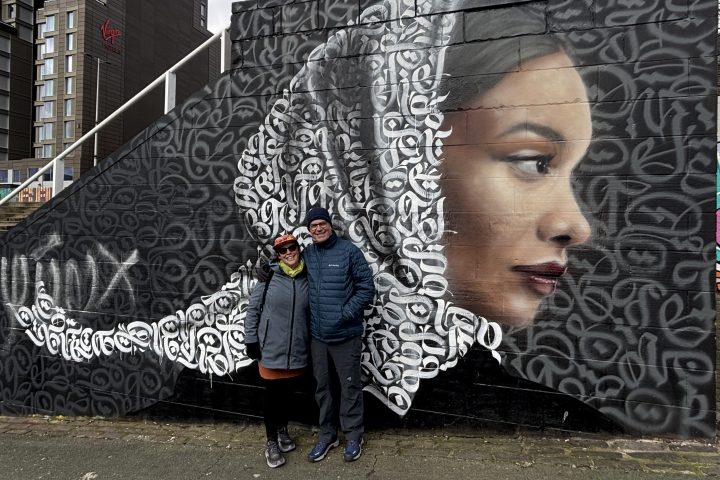 a person standing in front of a building