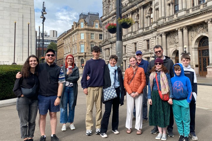 Ana Dabović et al. standing in front of a building