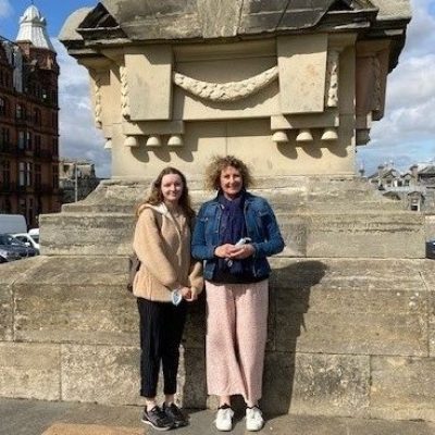 a person standing in front of a building