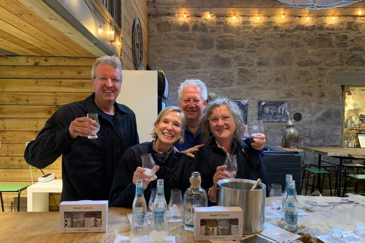 kip woodward et al. sitting at a table