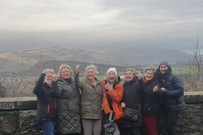 a group of people posing for a picture