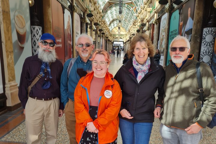 a group of people posing for the camera