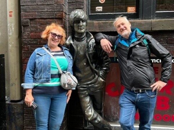 a group of people standing in front of a building