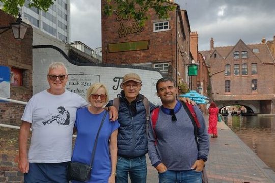 a group of people standing in front of a building