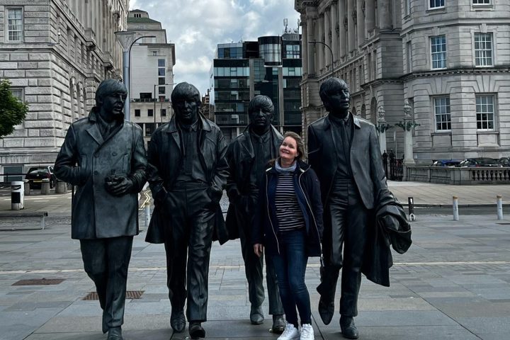 a group of people standing in front of a building