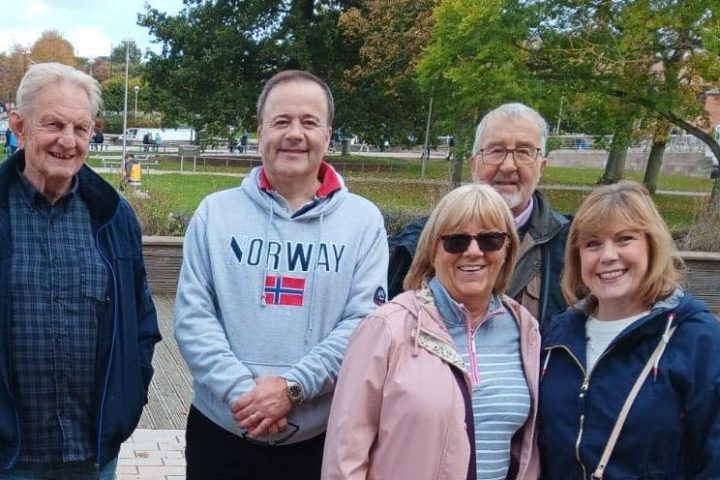 a group of people posing for the camera