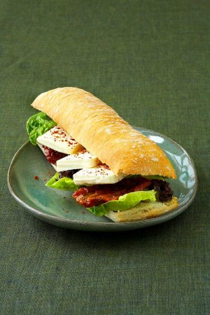 a sandwich cut in half on a plate