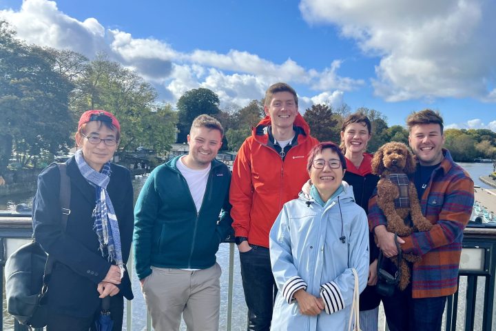 a group of people posing for a photo