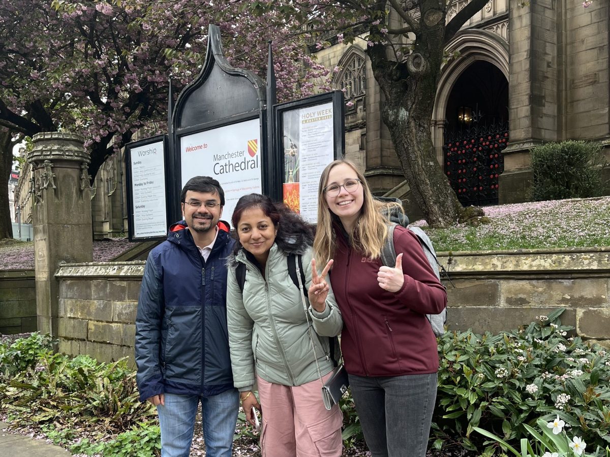 a group of people standing in front of a building