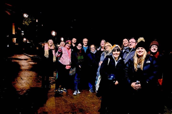 a group of people posing for the camera