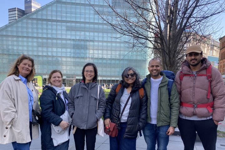 a group of people posing for the camera