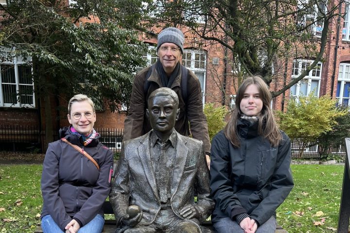 a group of people posing for the camera