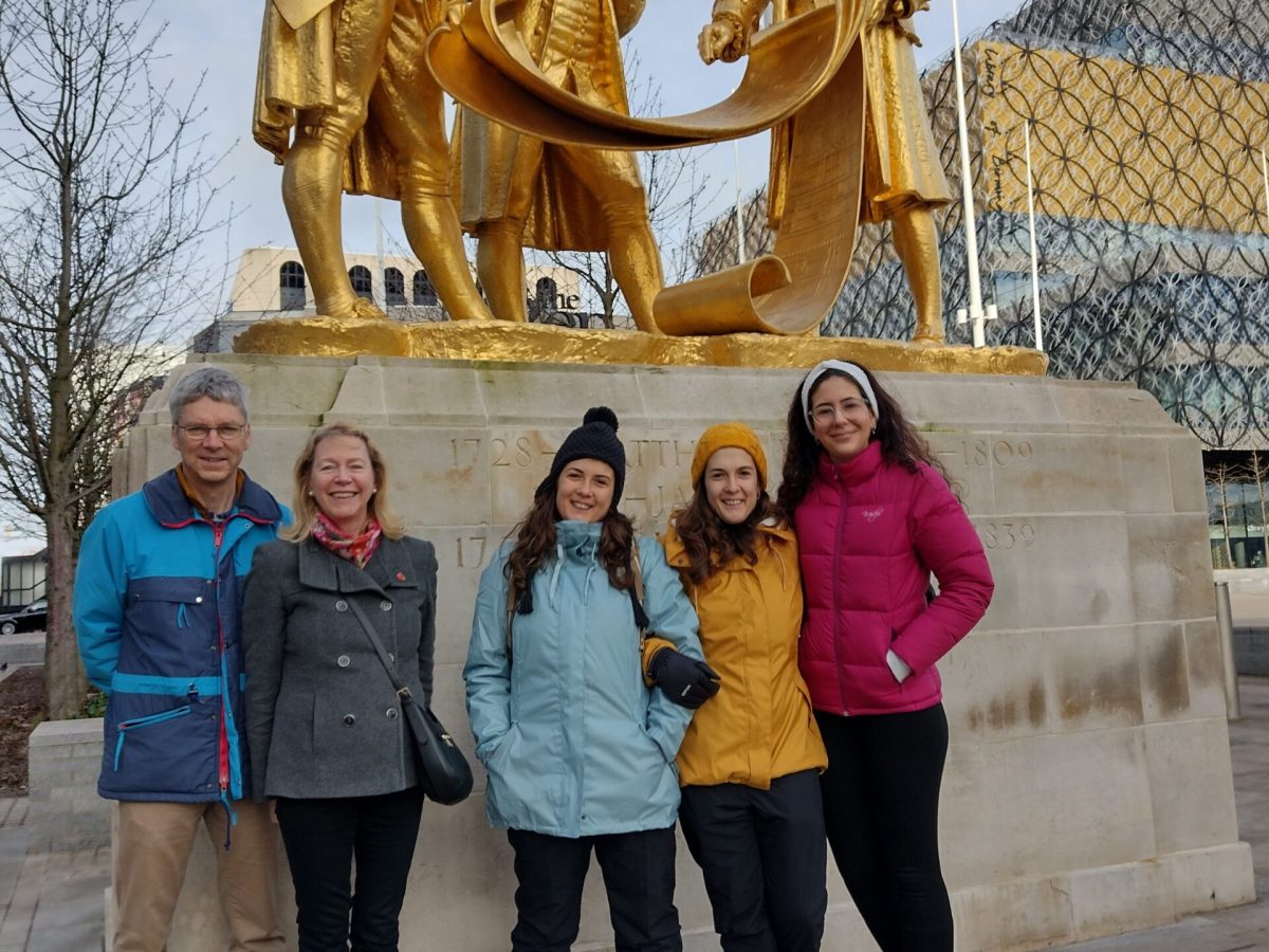 a group of people posing for a picture