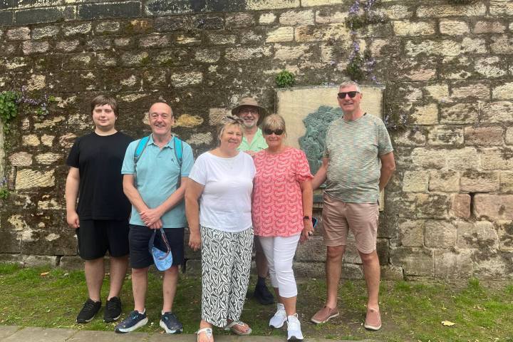 a group of people posing for a photo