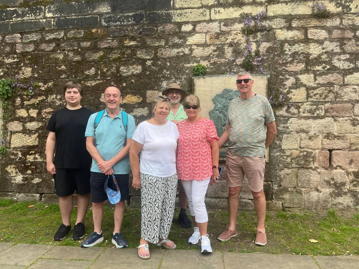 a group of people posing for a photo