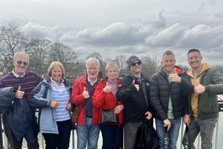 a group of people posing for a photo