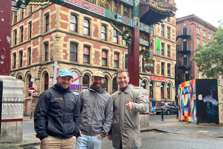 Christian Gerhaher et al. standing in front of a building