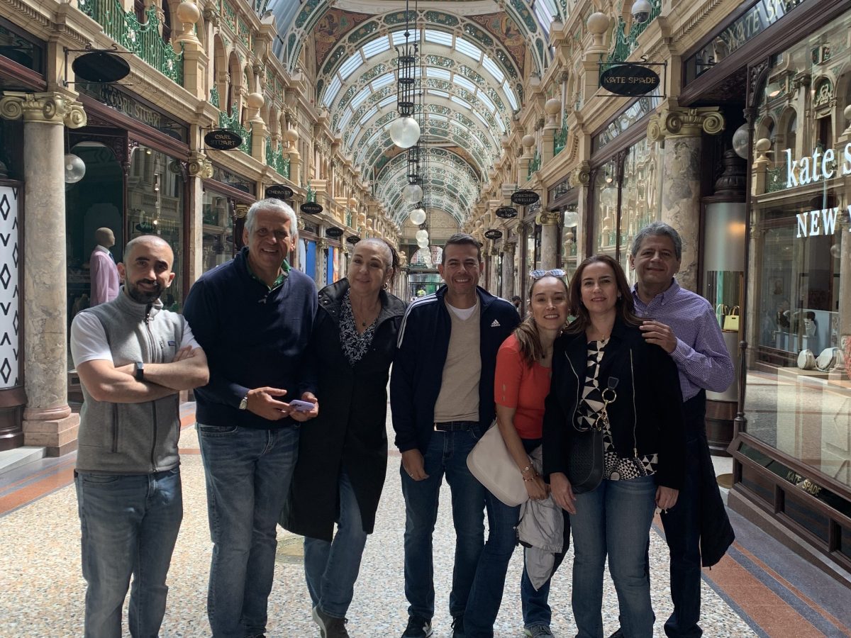 a group of people standing in front of a building