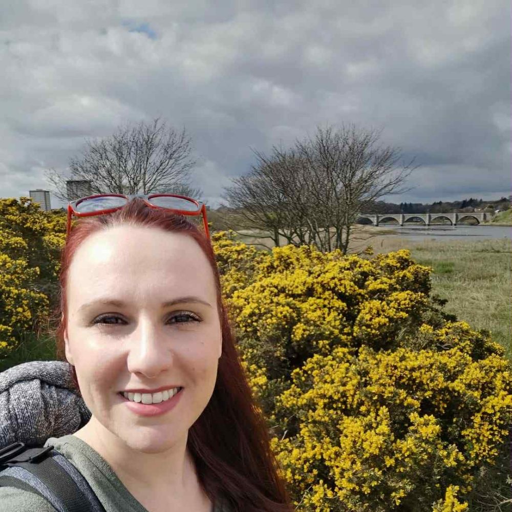a woman smiling for the camera