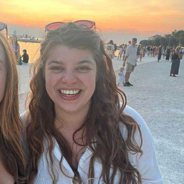 a woman smiling for the camera