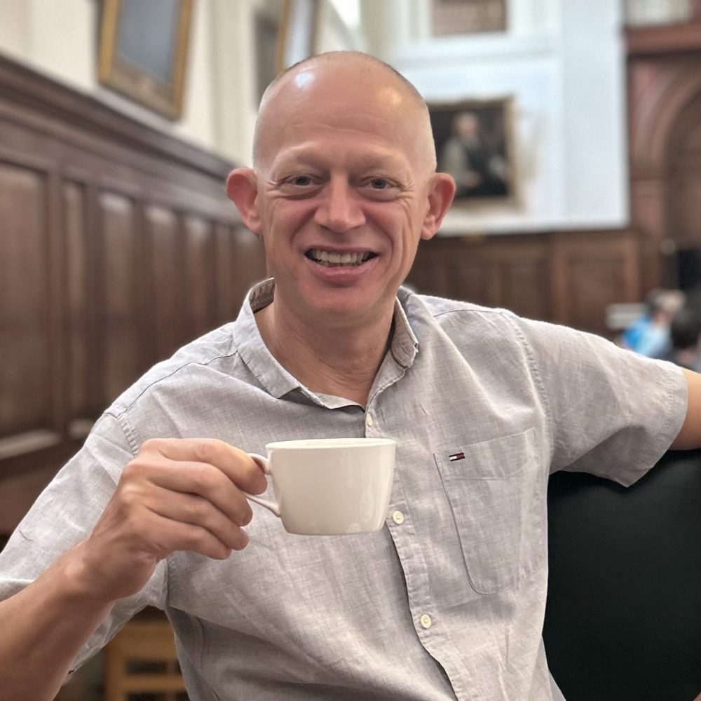 a man smiling for the camera